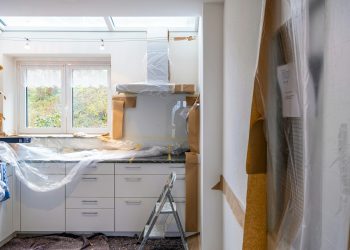 white wooden cabinet near window