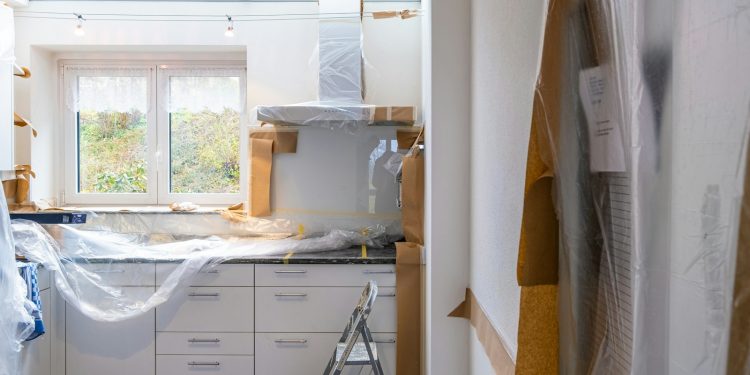 white wooden cabinet near window
